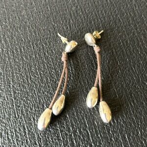 Earrings with silver studs and leather dangles